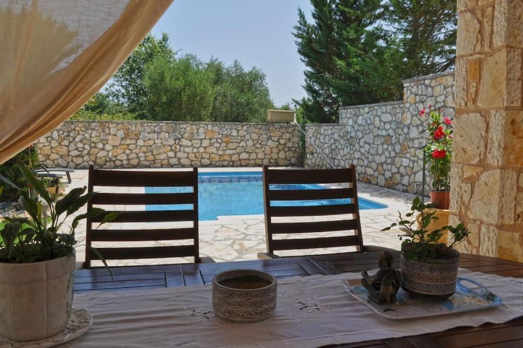Stone Pool House Gouvia Poulades